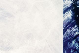 An abstract frame: a pale, almost white left side and a strip of swirling blue light on the right.
